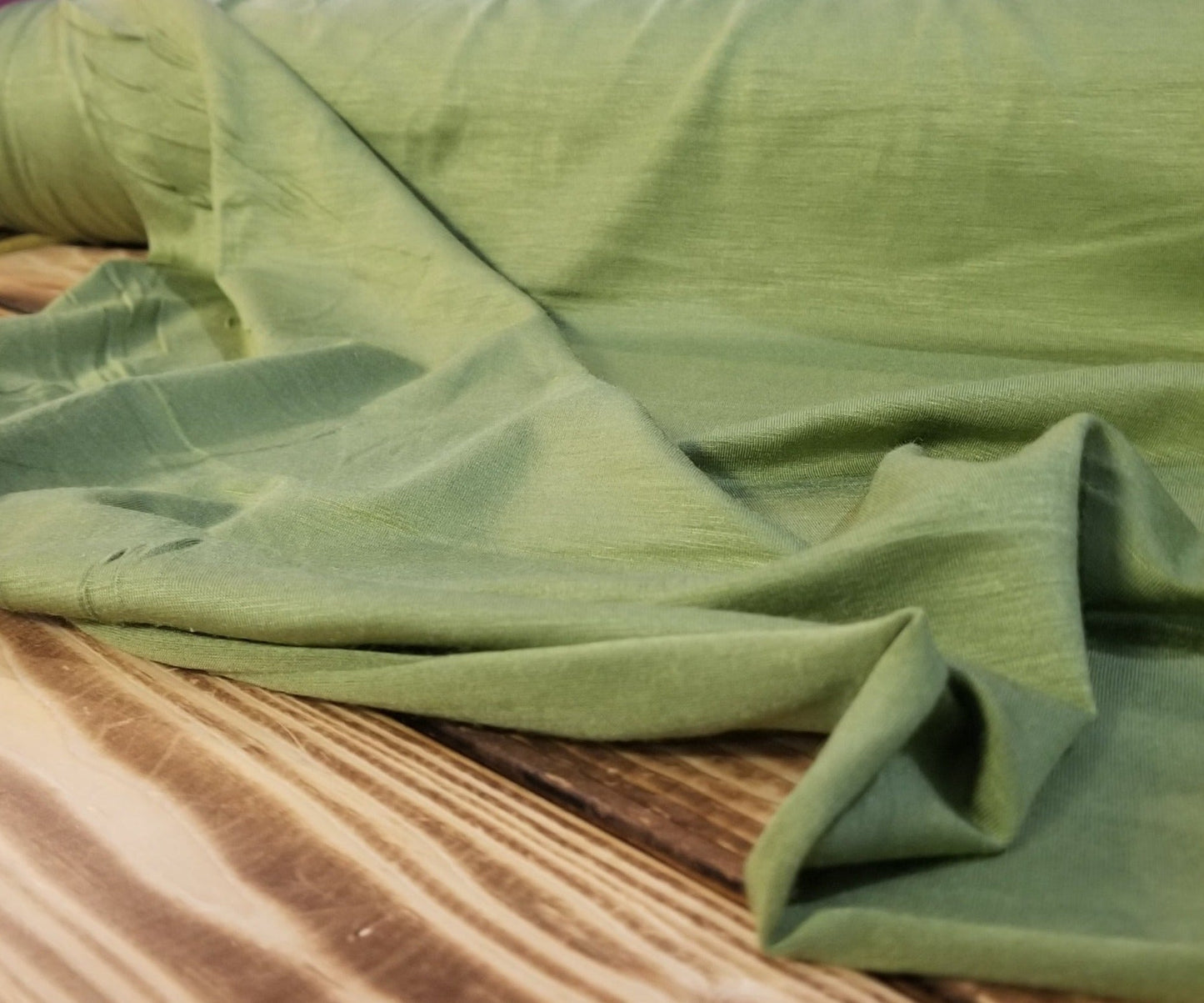 End of bolt: 4 yards of Designer Deadstock Rayon Wool Slub Stretch Jersey Avocado Green 5.5oz Knit-remnant