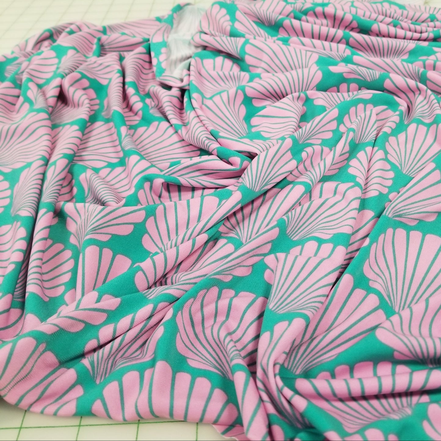 Designer Deadstock Sea Shells by the Sea Shore Pink and Turquoise ITY Knit-by the yard