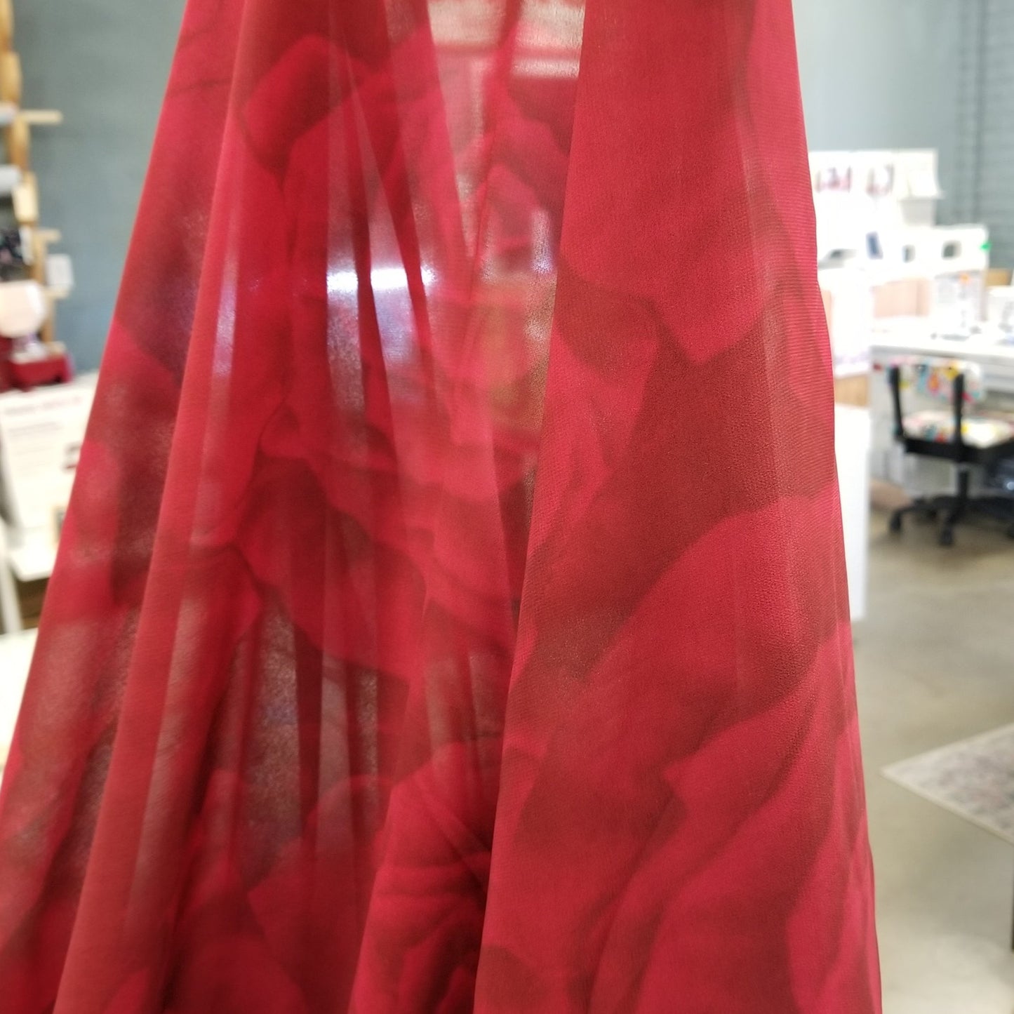 Red fabric with a blurred indoor background