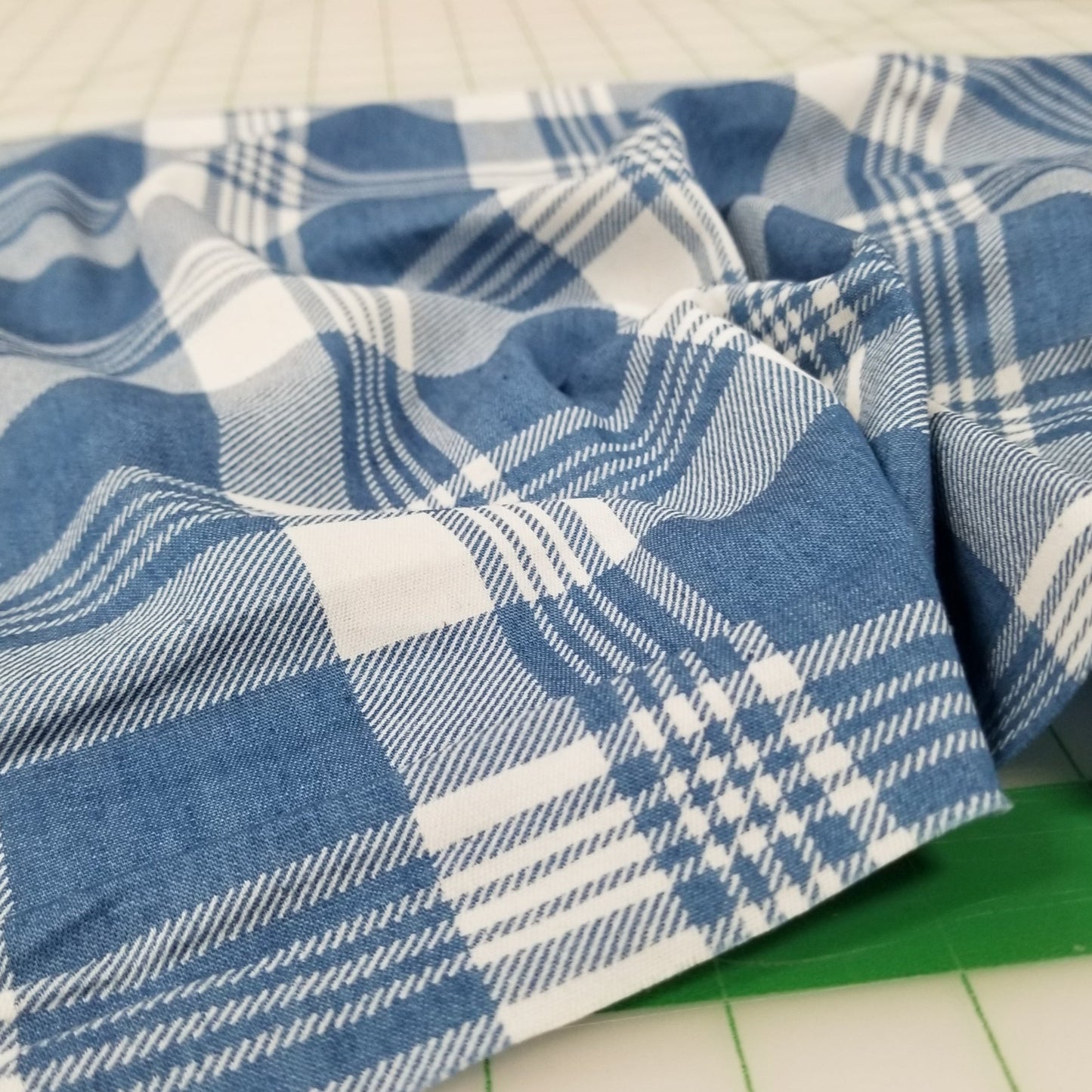 Close-up of blue and white plaid fabric