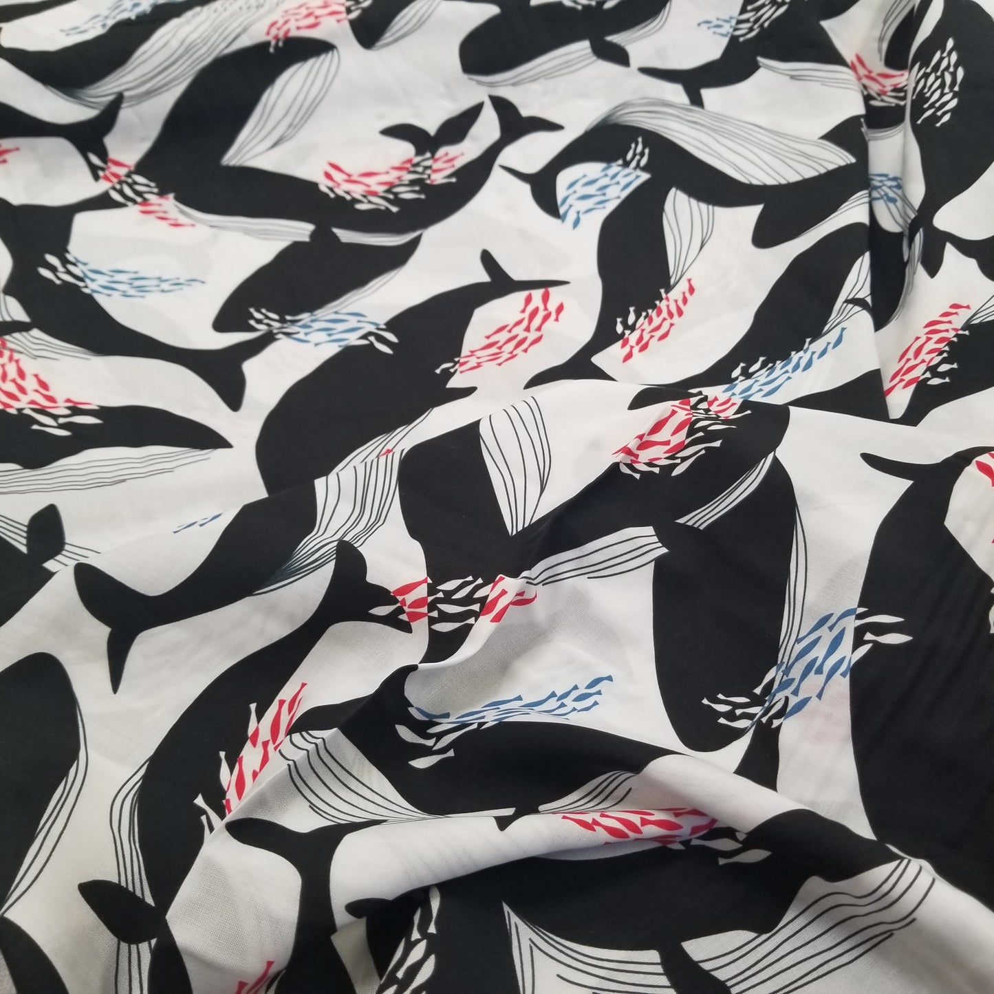Fabric with black and white whale pattern
