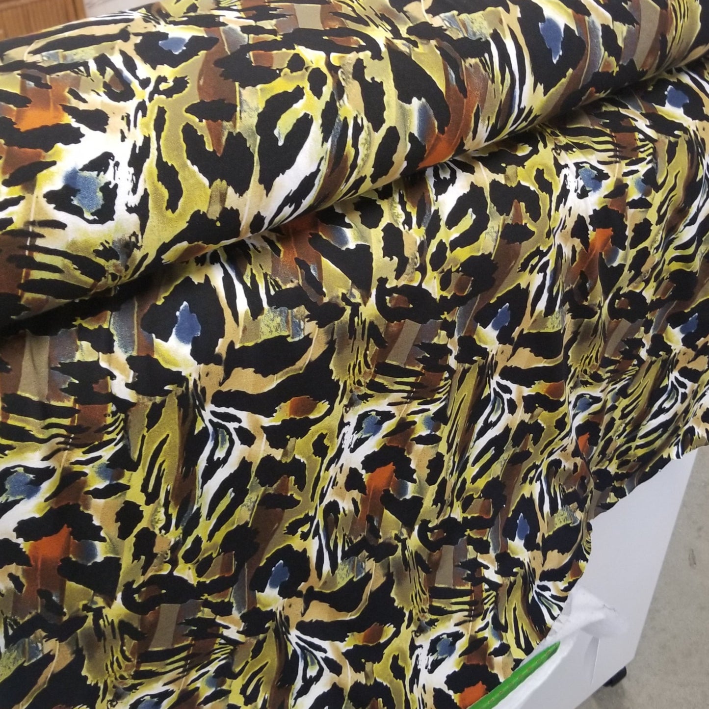 Patterned fabric on a mannequin with a blurred background
