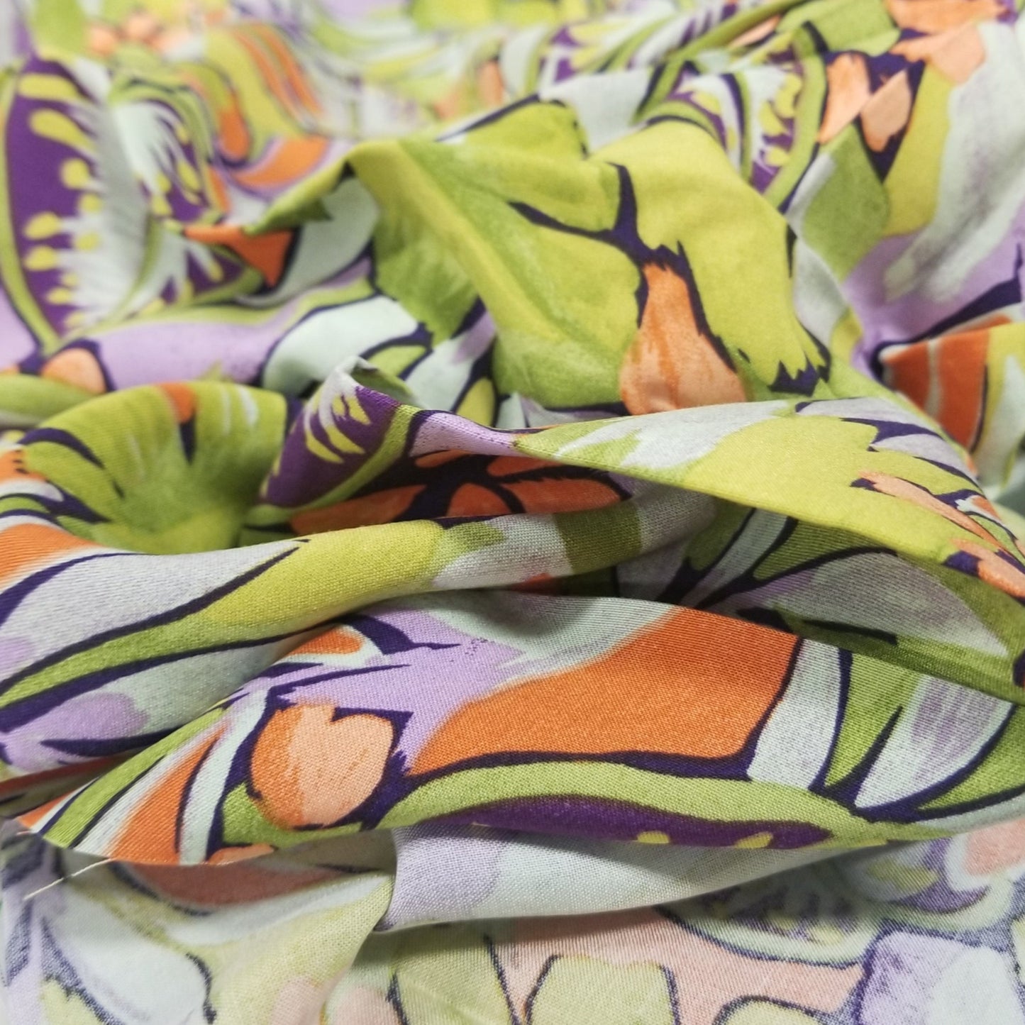 Close-up of colorful fabric with a leaf pattern