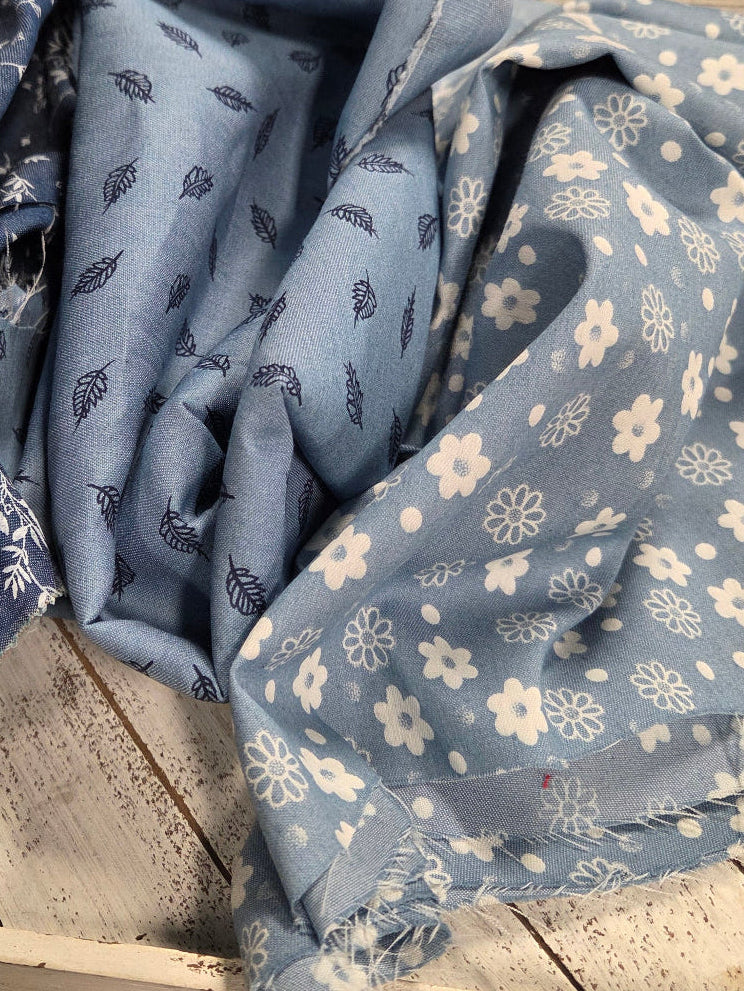 chambray shirting woven fabrics by the yard. group of printed chambray floral inspired prints