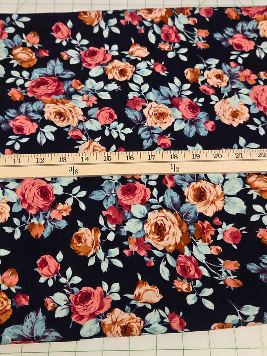 Floral fabric with a measuring tape on a grid background
