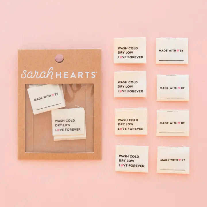 Packaged product with 'sarah Hearts' branding on a pink background