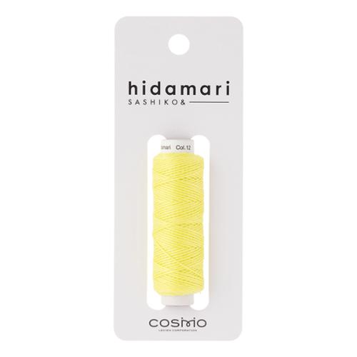 Yellow sashiko thread on a Hidamari branded card with Cosmo branding. visible mending thread sold by the spool
