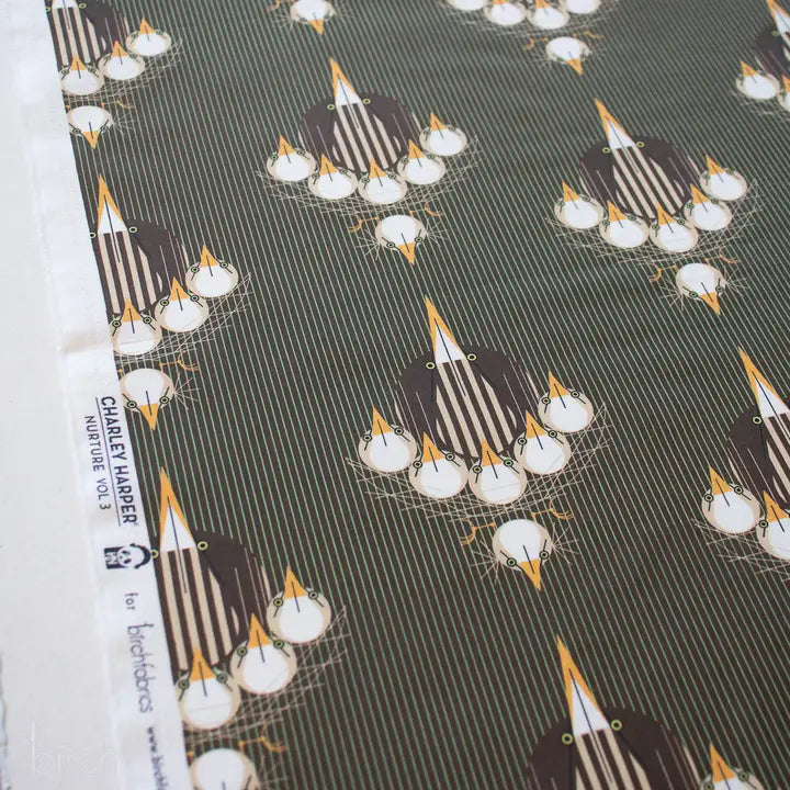Fabric with bird pattern and Charley Harper branding