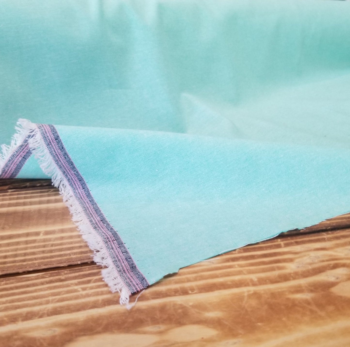 End of BOlt: 3.5 yards of Designer Deadstock Aquamarine Green Cotton Chambray Woven with Pink Selvedge -remnant