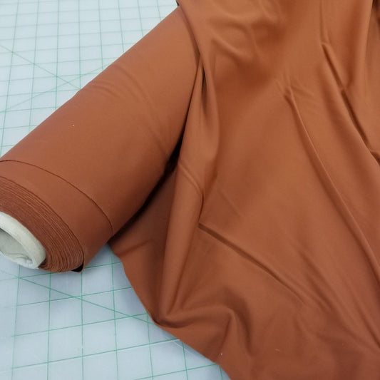 End of Bolt: 2 yards of Designer Deadstock Sample Yardage Nylon Spandex  Rust Knit- remnant