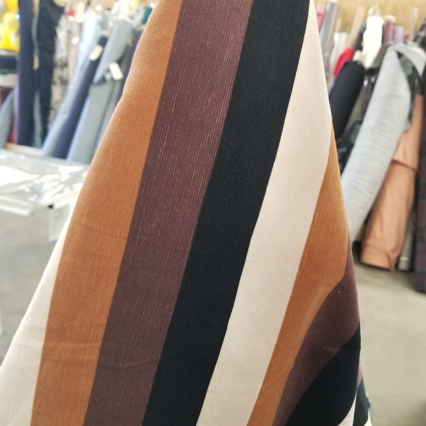 End of Bolt: 7/8th yard of Designer Deadstock Vertical Black and Brown Stripe Baby Wale Corduroy Woven- remnant