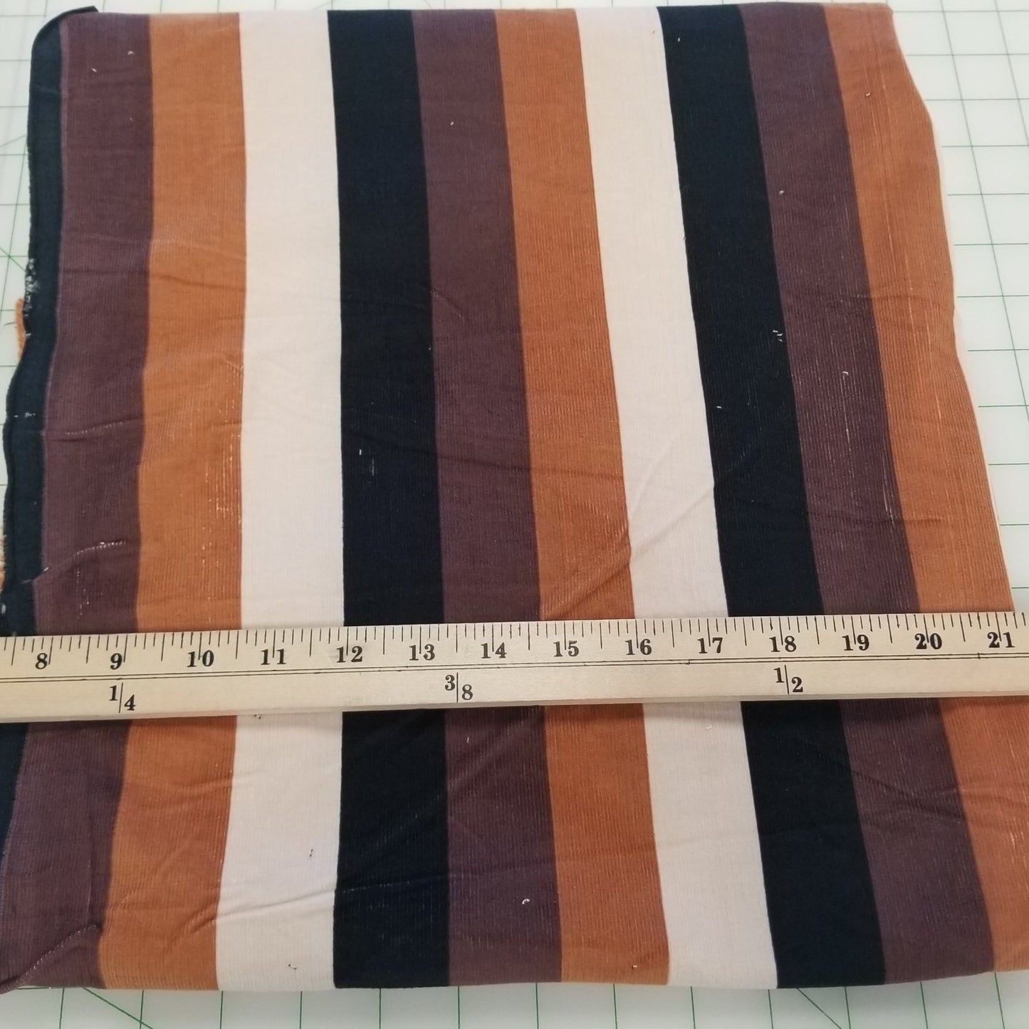 End of Bolt: 7/8th yard of Designer Deadstock Vertical Black and Brown Stripe Baby Wale Corduroy Woven- remnant