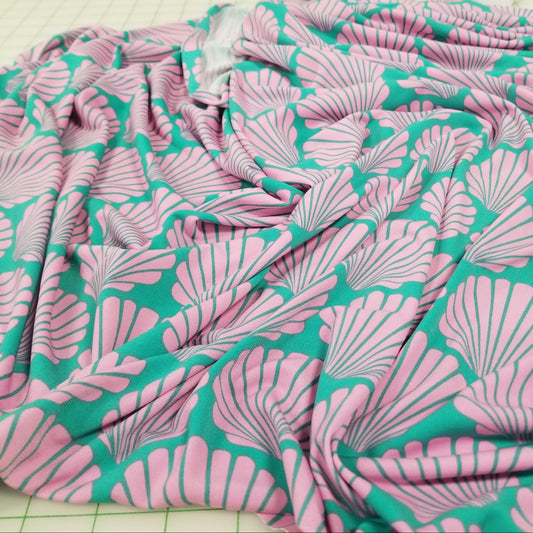 Designer Deadstock Sea Shells by the Sea Shore Pink and Turquoise ITY Knit-by the yard