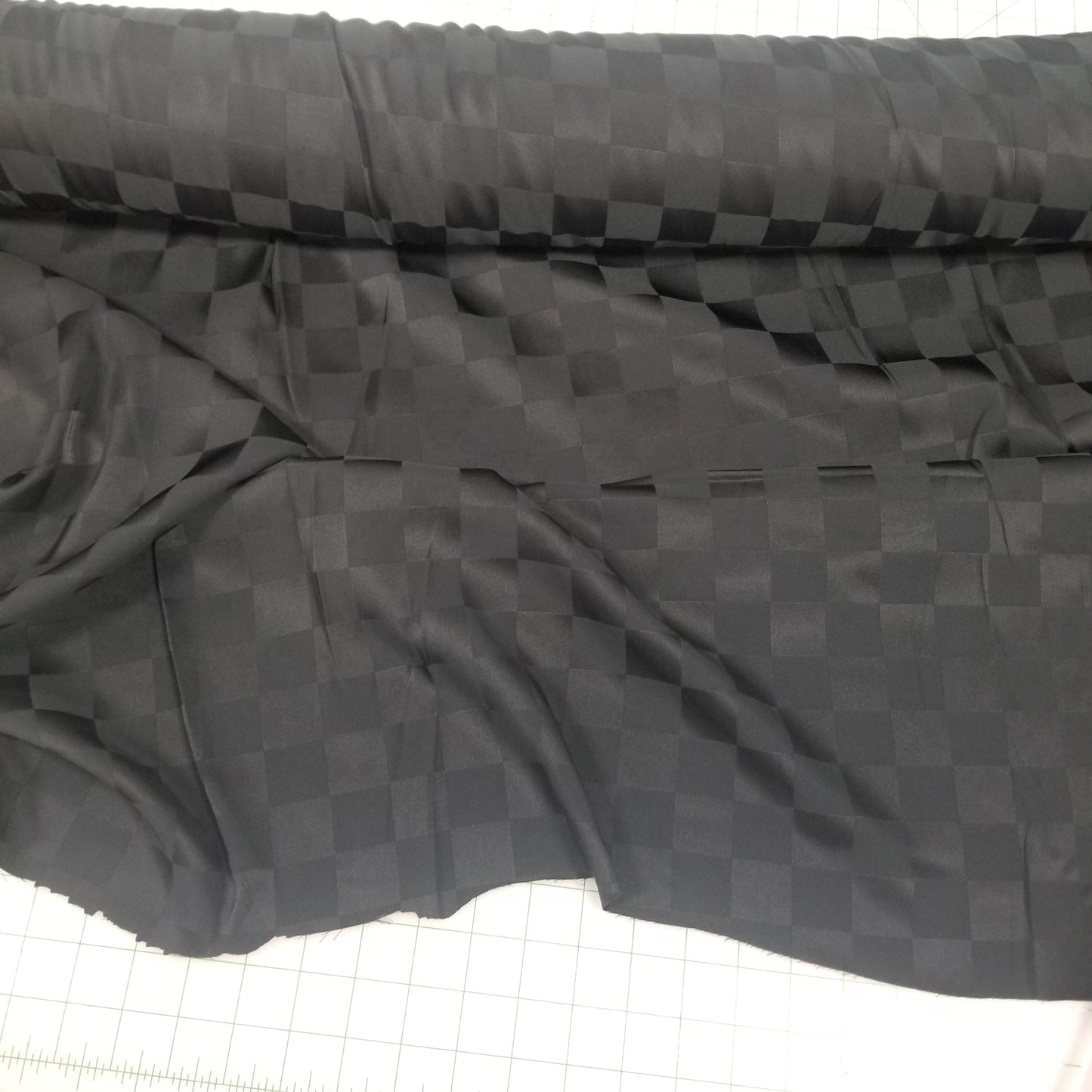 checkered fabric woven. stretch satin woven.  LA Finch fabrics.