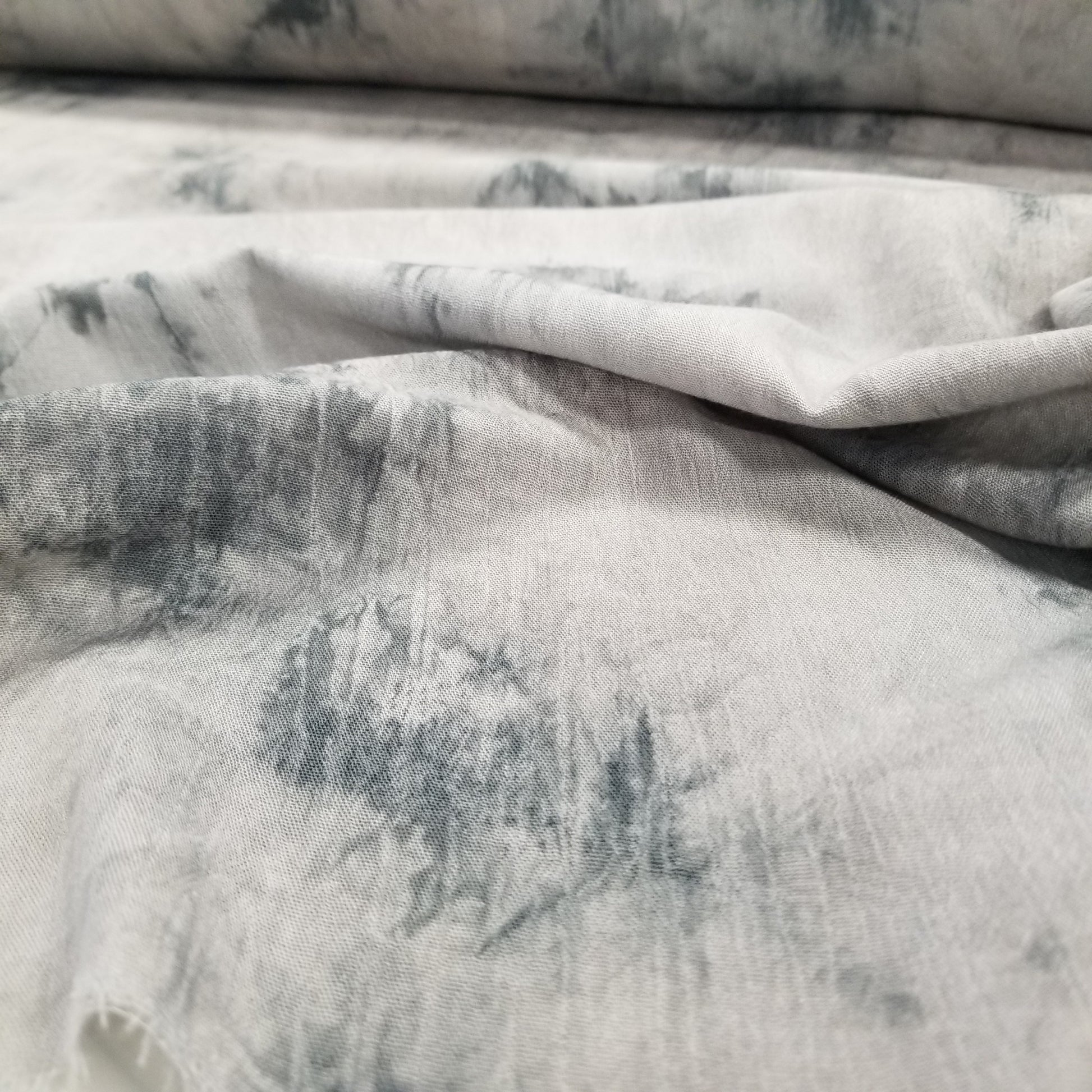 Close-up of textured gray fabric with a pattern
