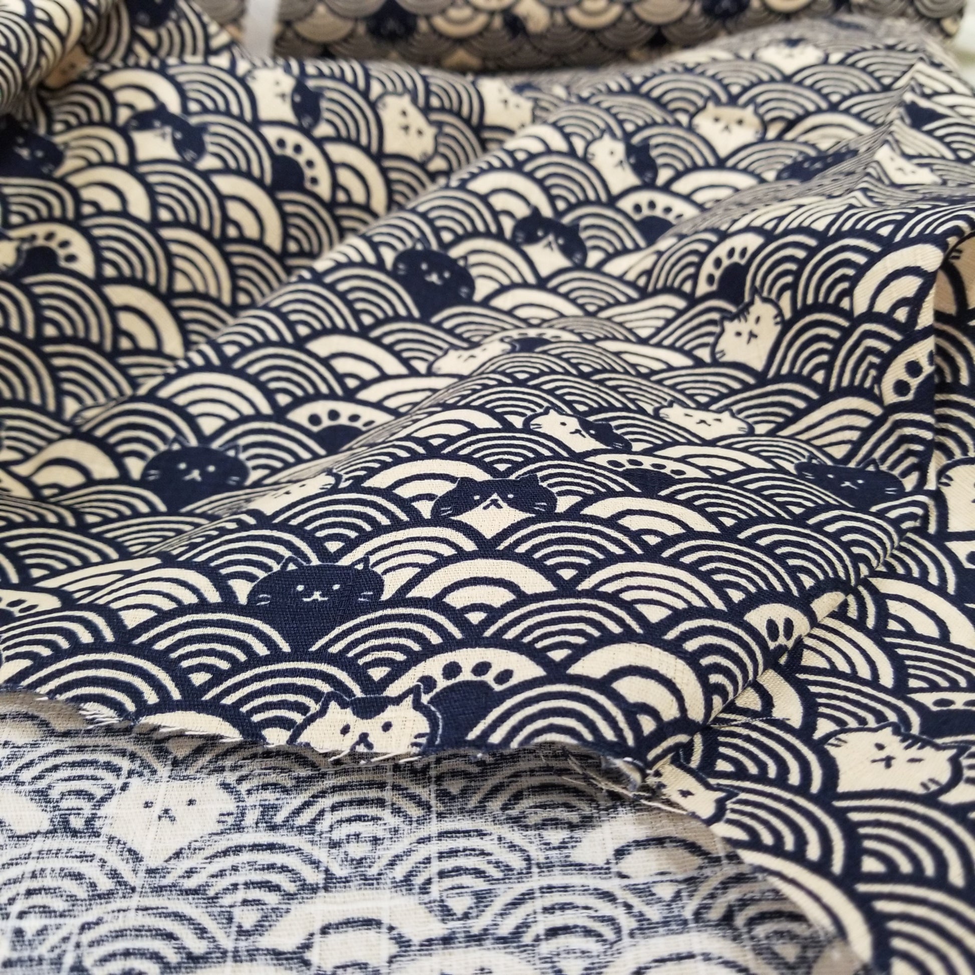 Close-up of fabric with blue and white wave pattern