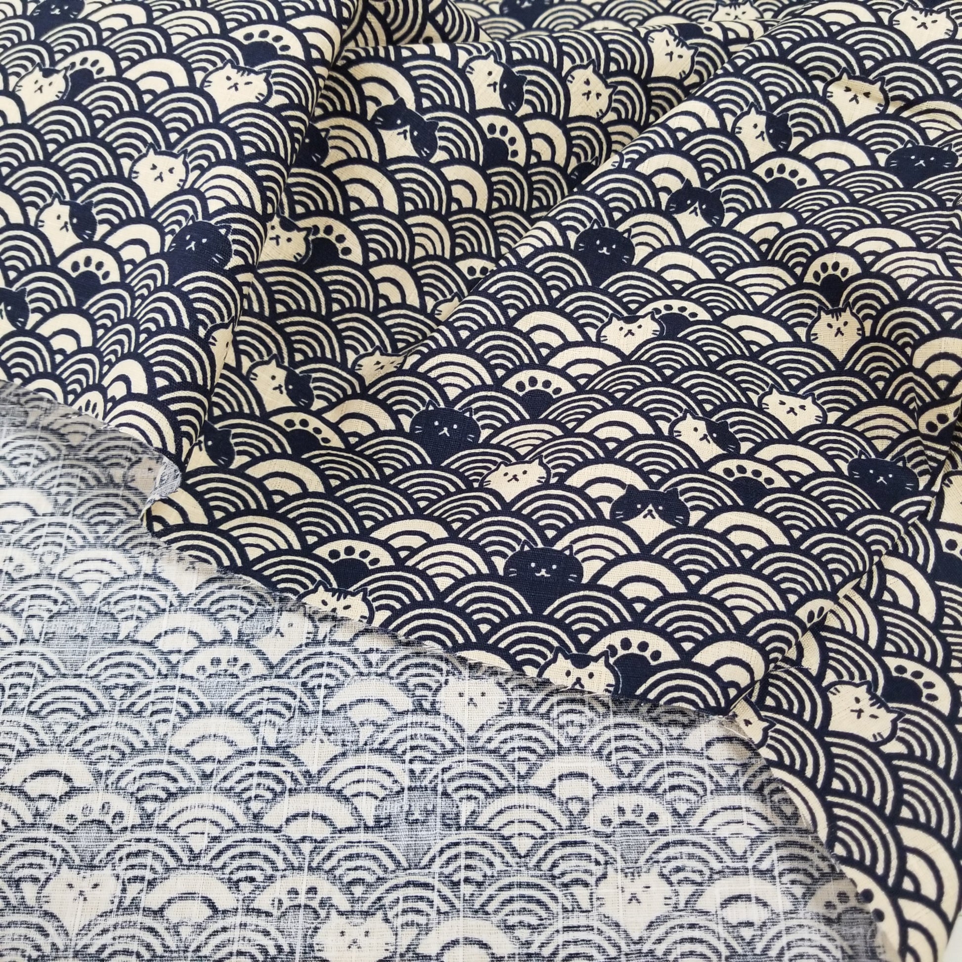 Three fabric swatches with different patterns: abstract wave design, floral pattern, and geometric pattern.