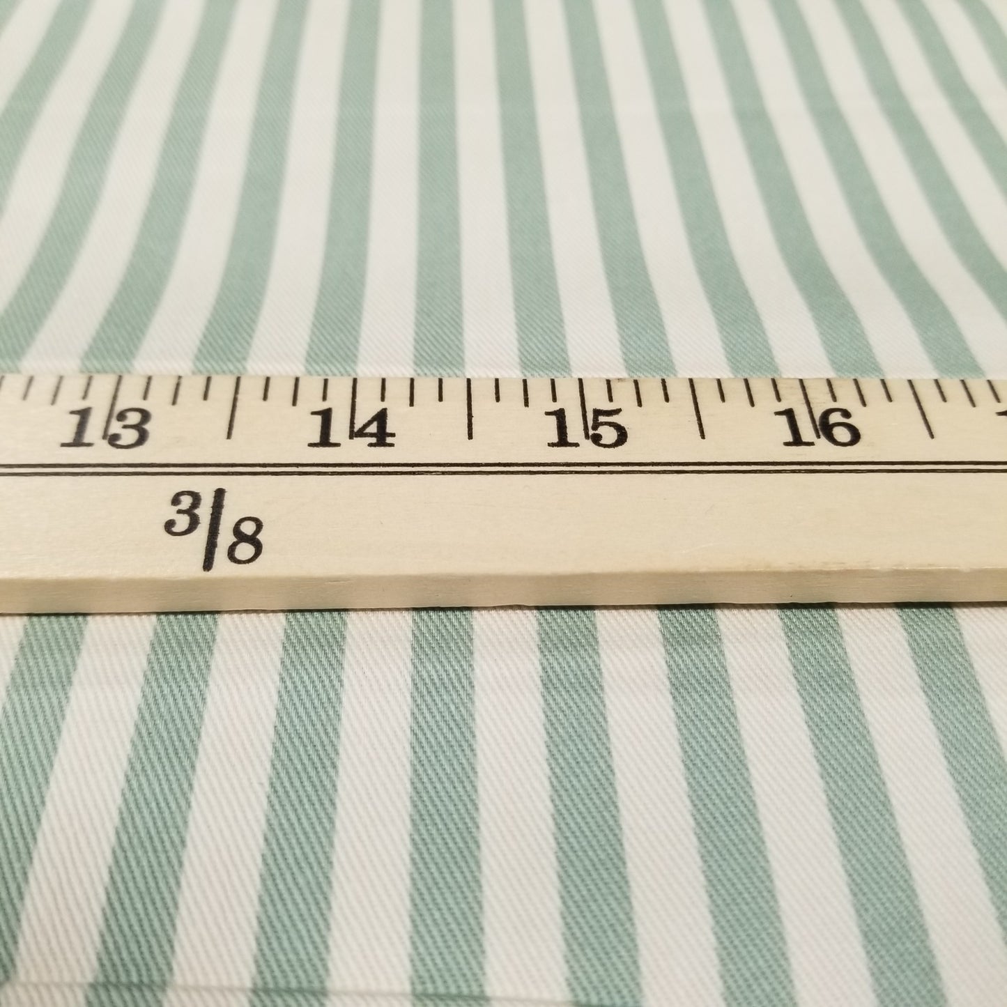 Striped fabric with a ruler for scale