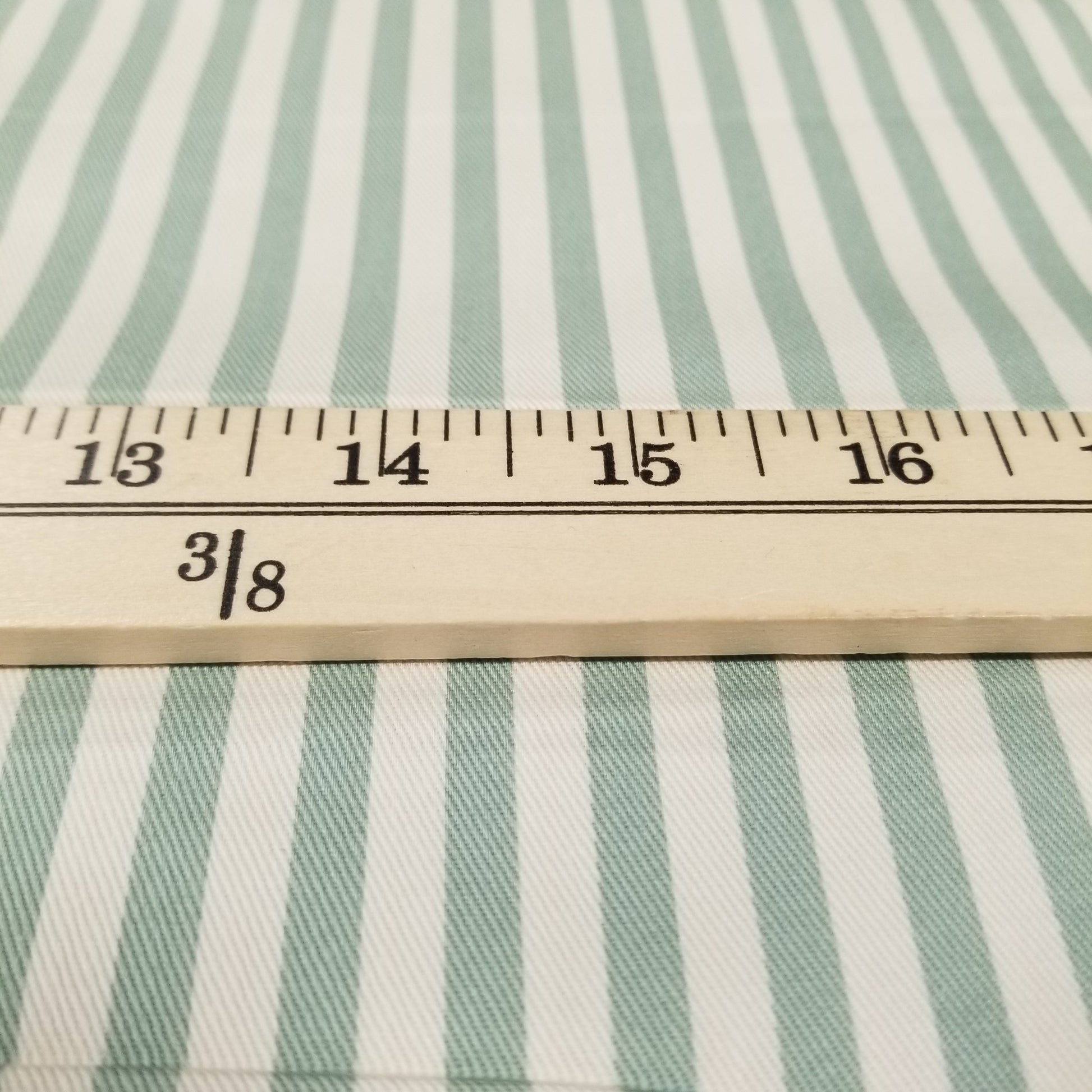 Striped fabric with a ruler for scale