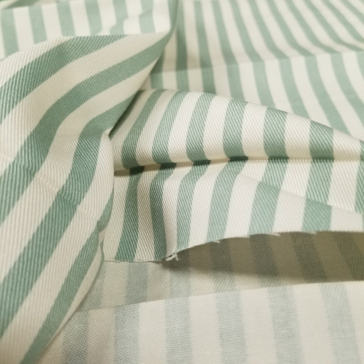 Close-up of green and white striped fabric