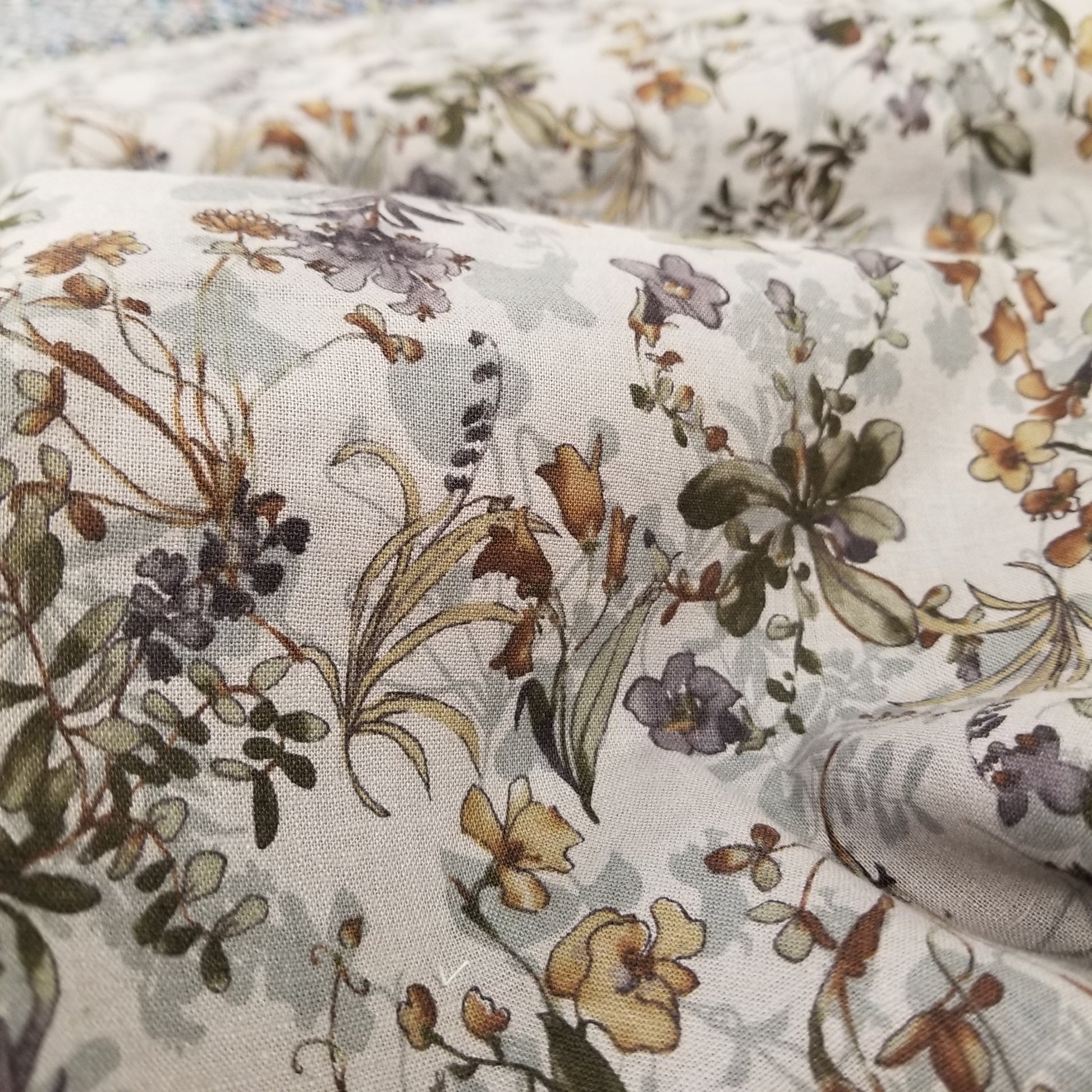 Floral patterned fabric with a neutral color palette