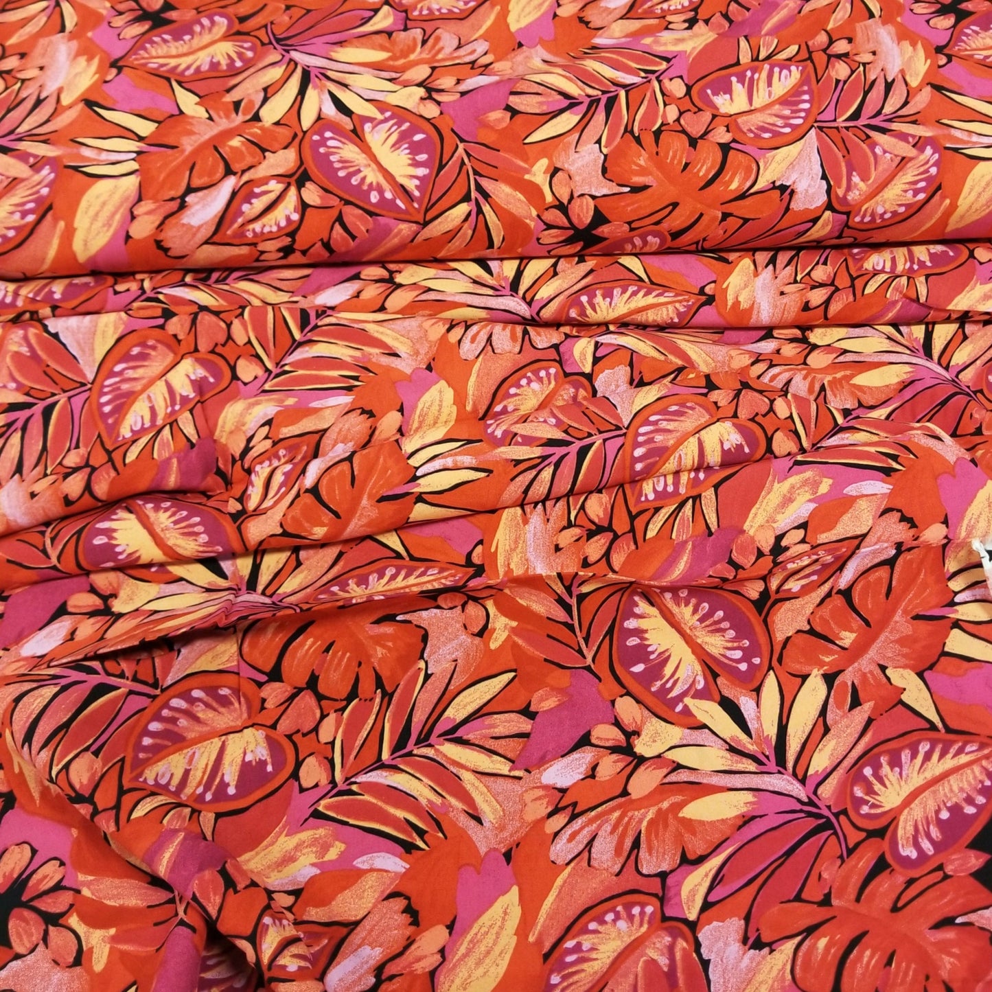 Fiberglass mold with a vibrant orange and pink leaf pattern