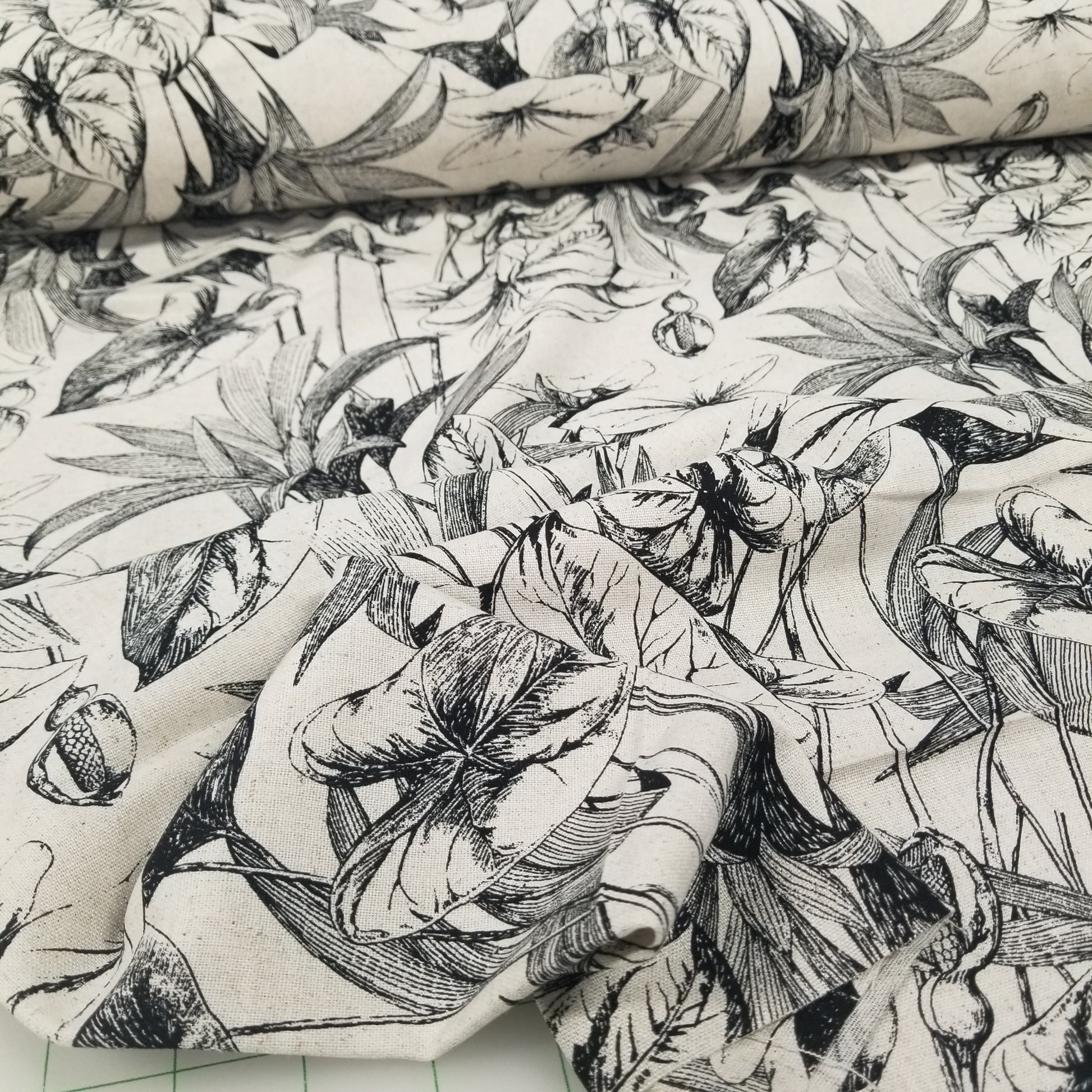 Close-up of fabric with black and white floral pattern