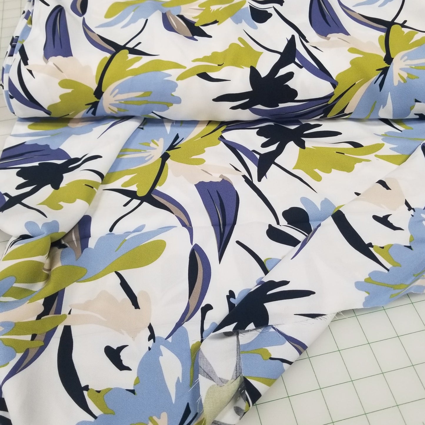 Fabric with a floral pattern on a grid background