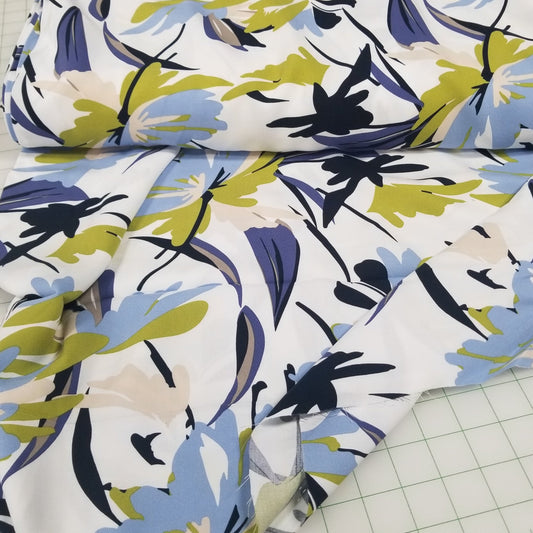 Fabric with a floral pattern on a grid background