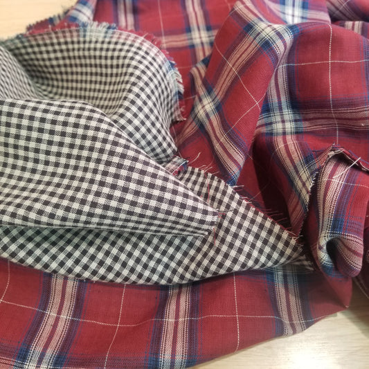 Plaid and checkered fabric swatches in red, blue, white, and black.