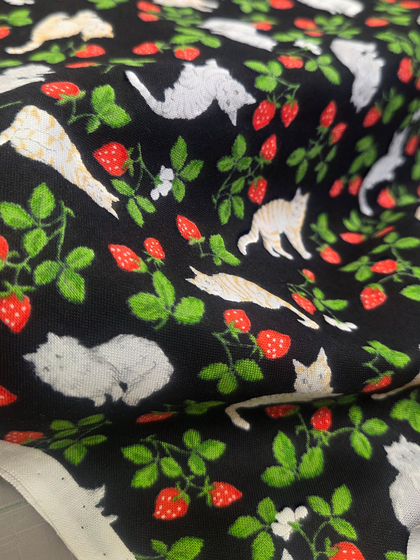 Japan Fabric: Black Cotton Woven with Cats and Strawberries- by the yard