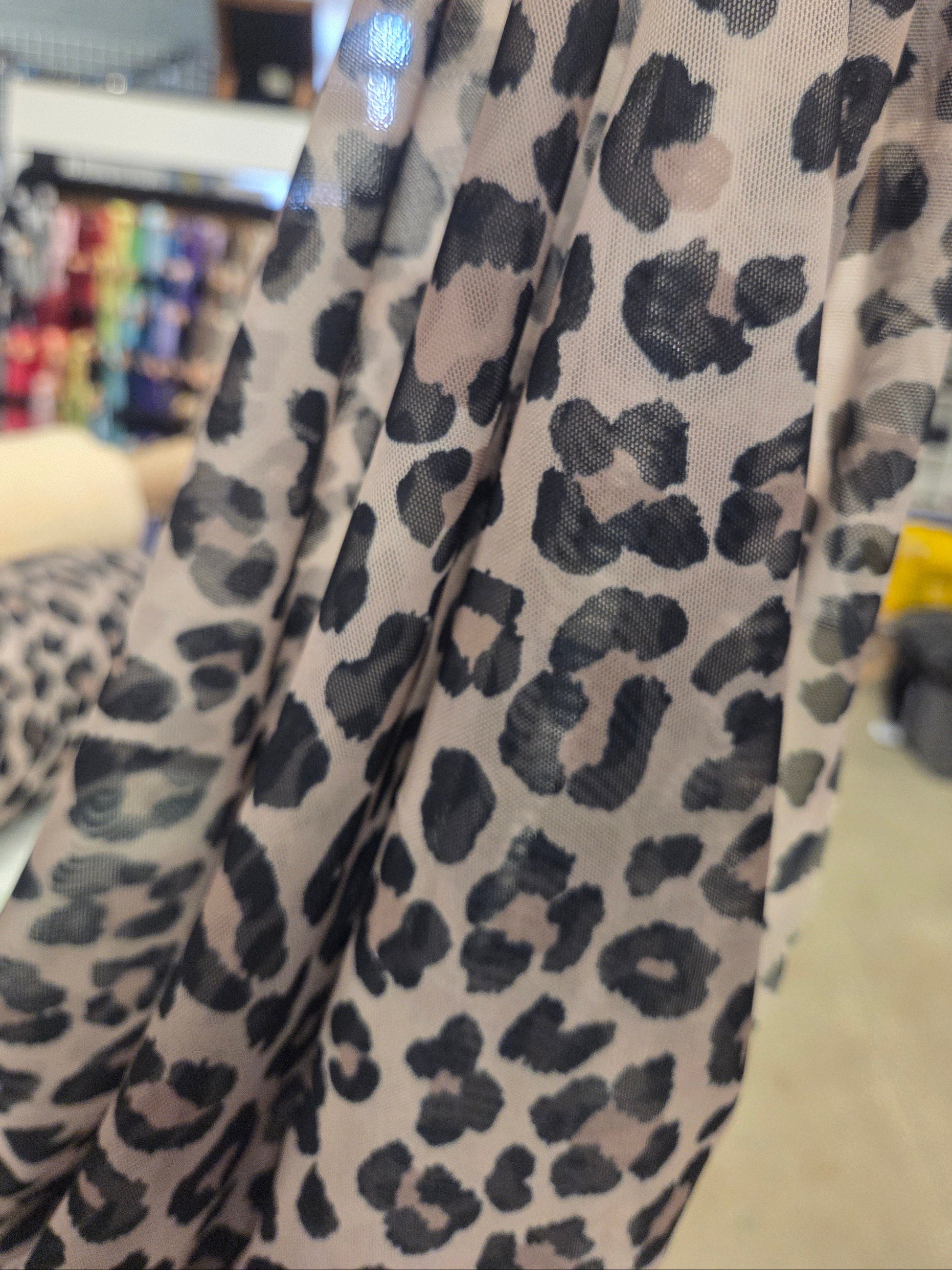 leopard mesh knit fabric by the yard. Designer deadstock fabric for garment making