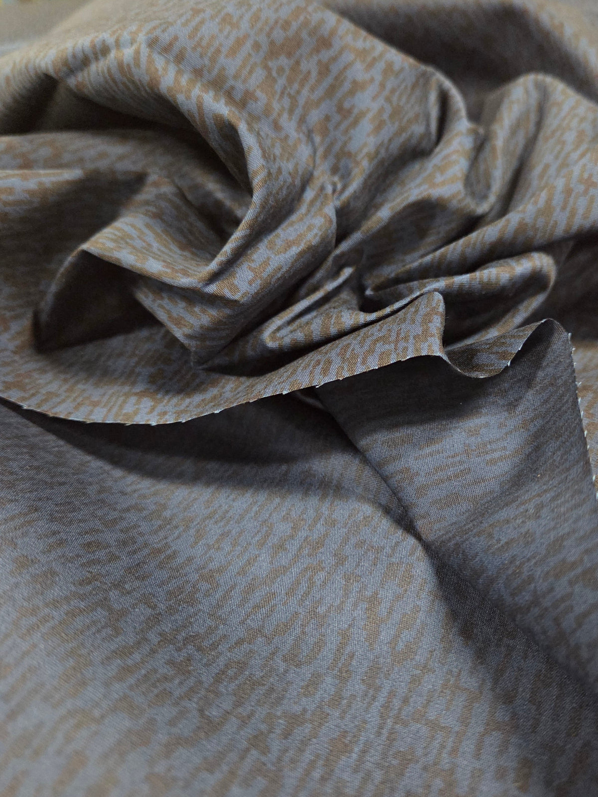 Close-up of patterned fabric with a blurred background