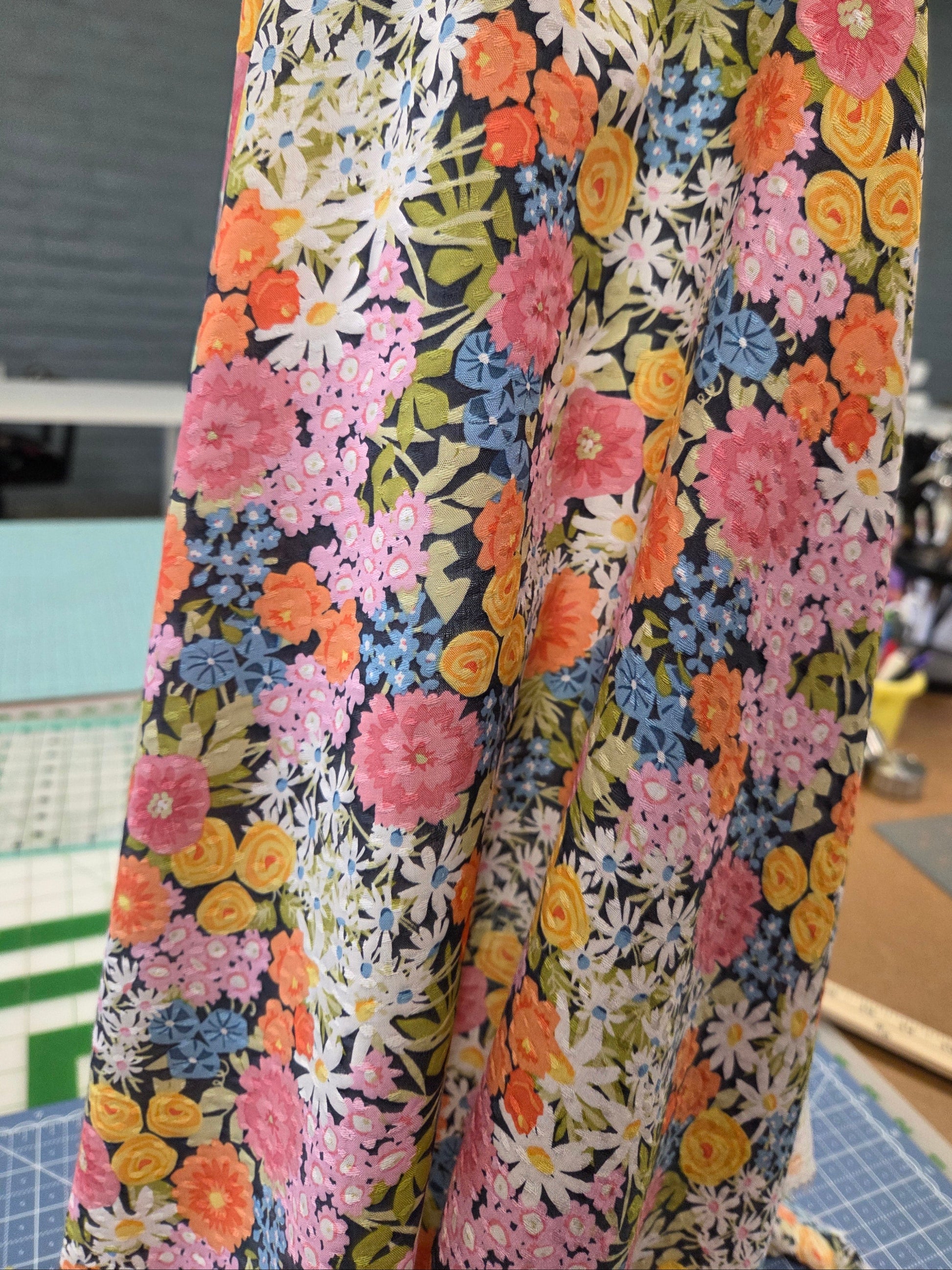 clip dot voile fashion fabric with overlaying florals