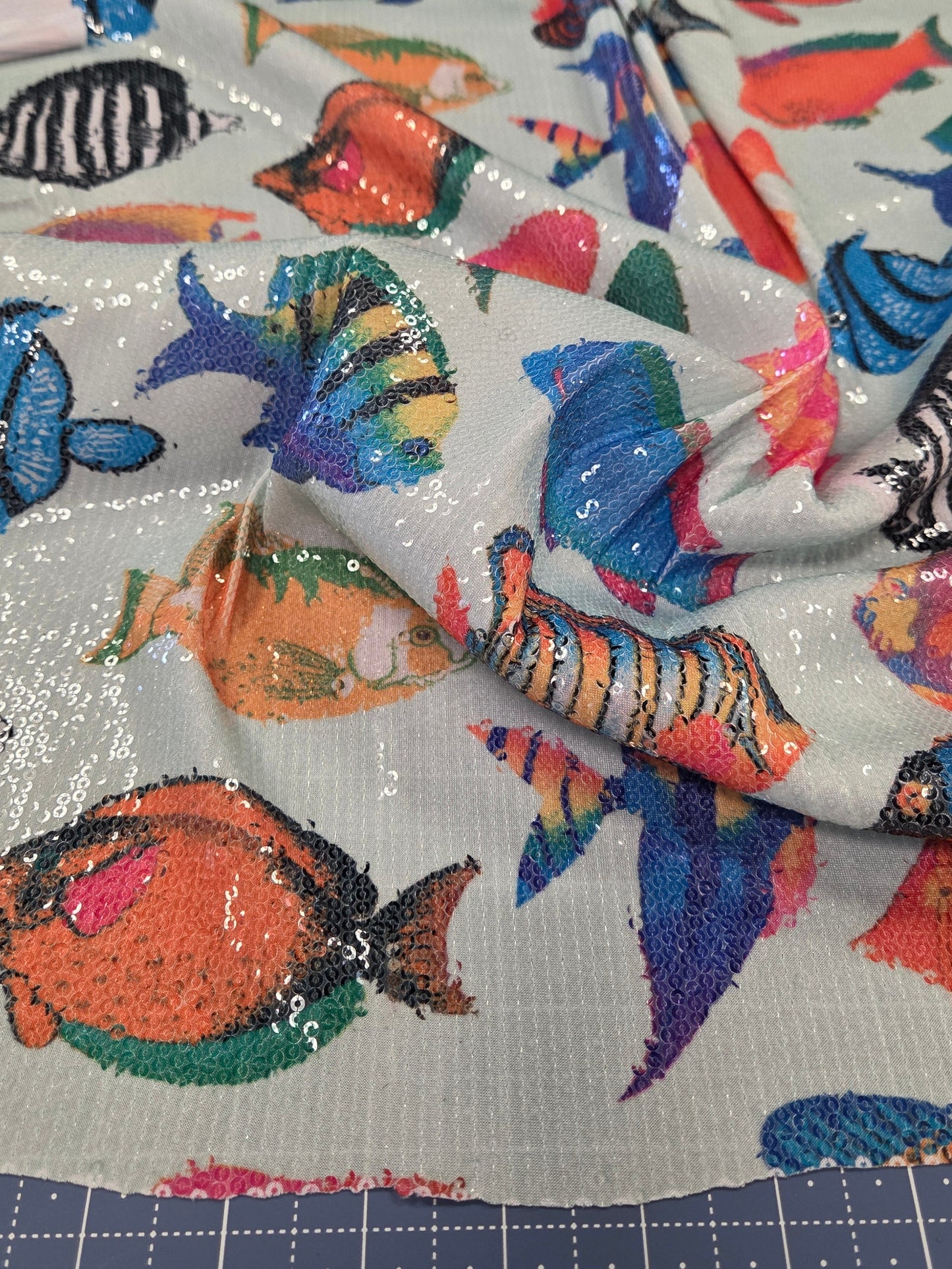 Special Occasion Designer Deadstock Iridescent Sequin Stretch Tropical Fishes on a ITY Jersey Knit- By the yard
