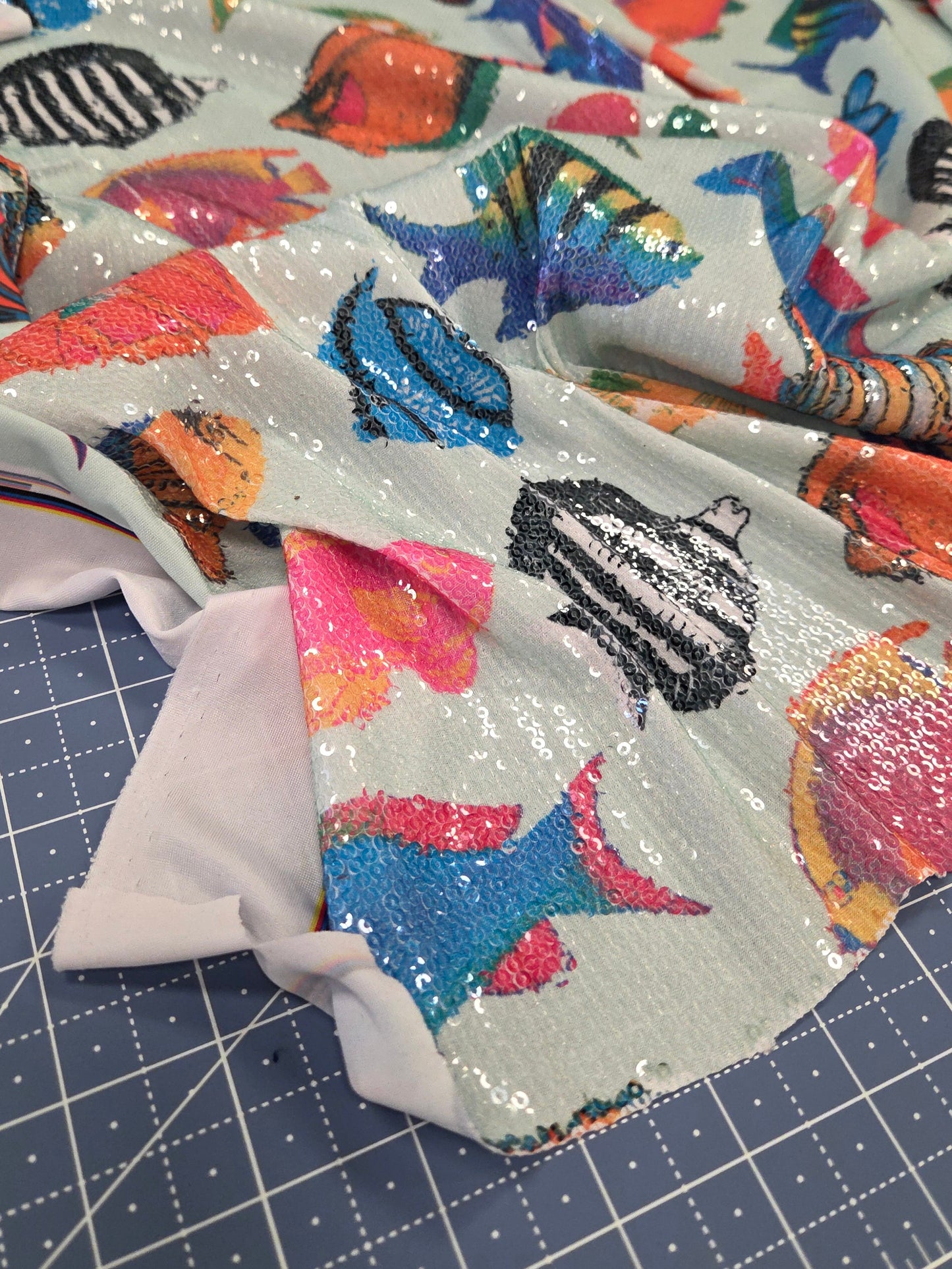 Special Occasion Designer Deadstock Iridescent Sequin Stretch Tropical Fishes on a ITY Jersey Knit- By the yard