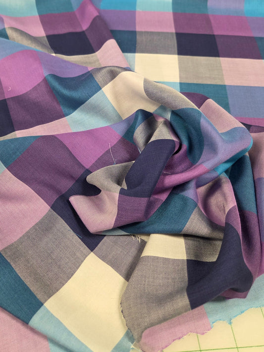 Multicolored checkered fabric on a tiled floor