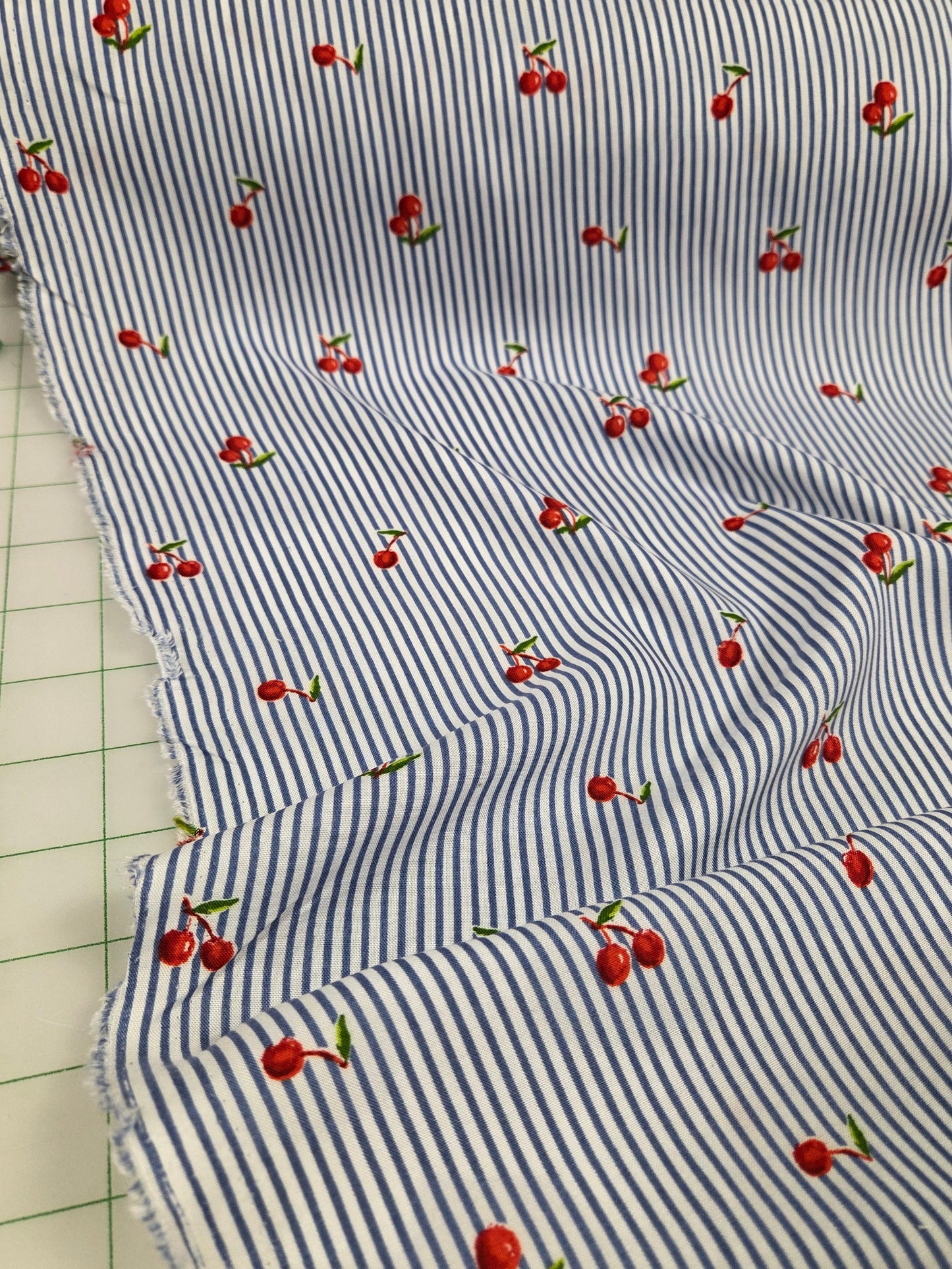 Designer Deadstock Rayon Challis Vertical Small Light Blue Stripe with Cherries Woven- by the yard