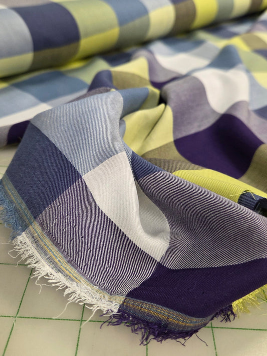 Colorful fabric with geometric pattern on a cutting mat