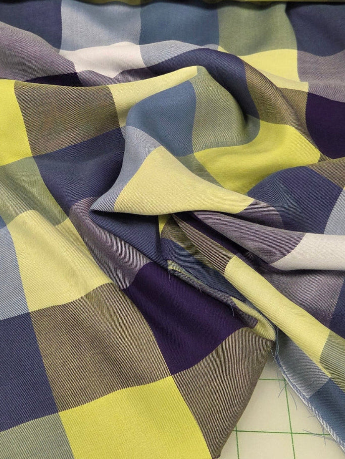 Plaid fabric with a ruler showing measurements