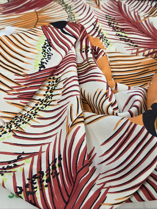 Close-up of patterned fabric with abstract design. Fashion Fabric by the yard