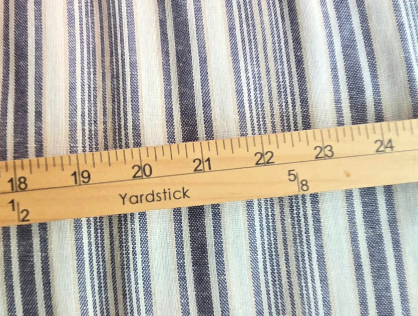 designer deadstock :A rayon linen multi stripe woven for garment making. Fabric by the yard. Tan and blue with ivory.