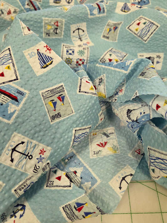 Japan Fabrics: Sevenberry Cotton Seersucker Nautical Stamps Print Light Blue Woven- by the yard