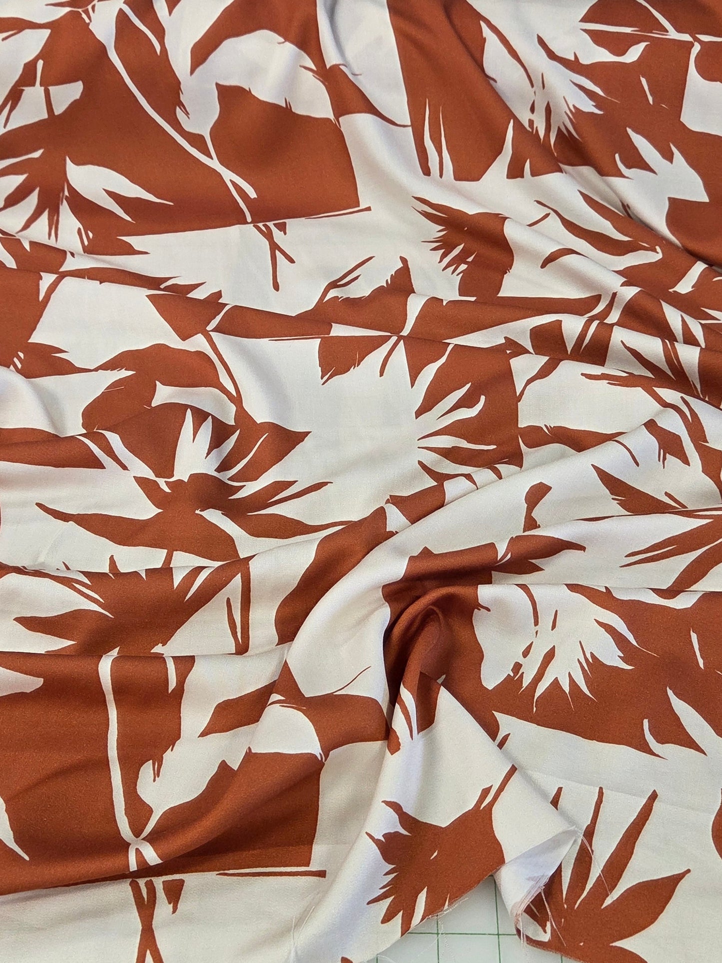 Designer Deadstock Viscose Satin Burnt Orange and Cream Tropical Birds of a Feather Foliage Woven-by the yard