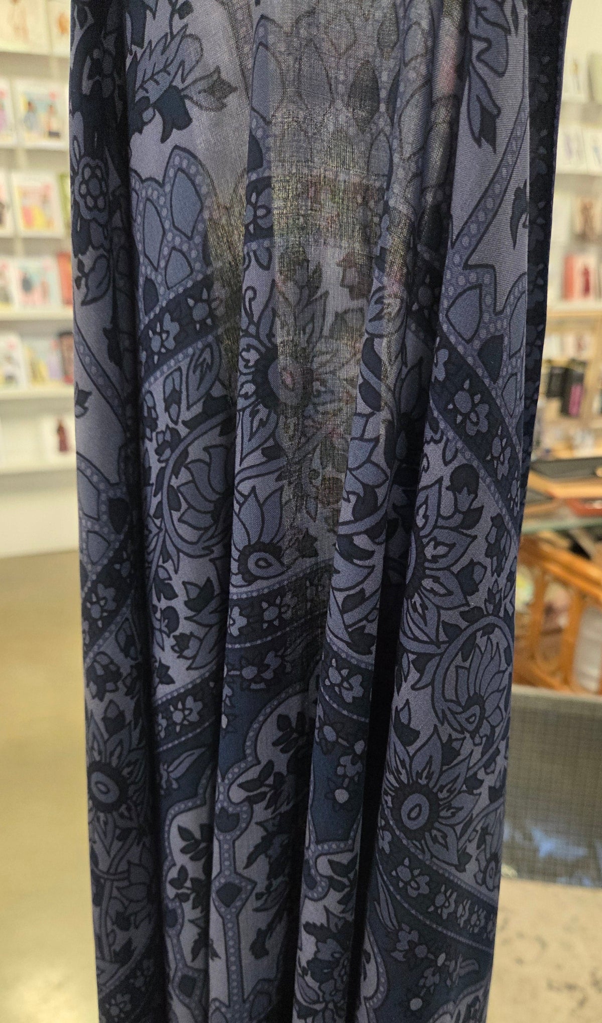 rayon held up to see sheerness of the voile fabric