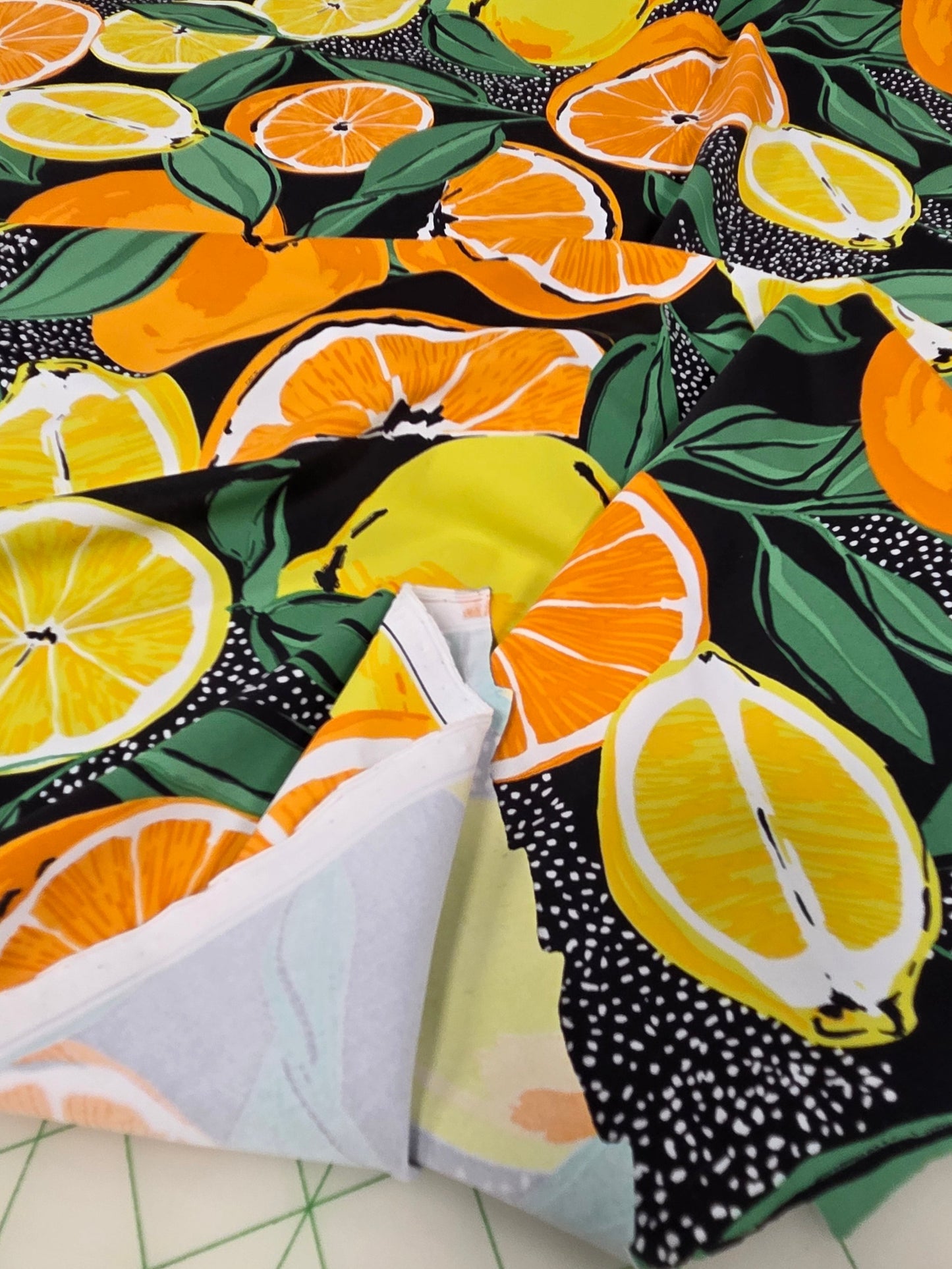 Lemon and Oranges Fruity Nylon Spandex Swim/Activewear Black Knit- by the yard