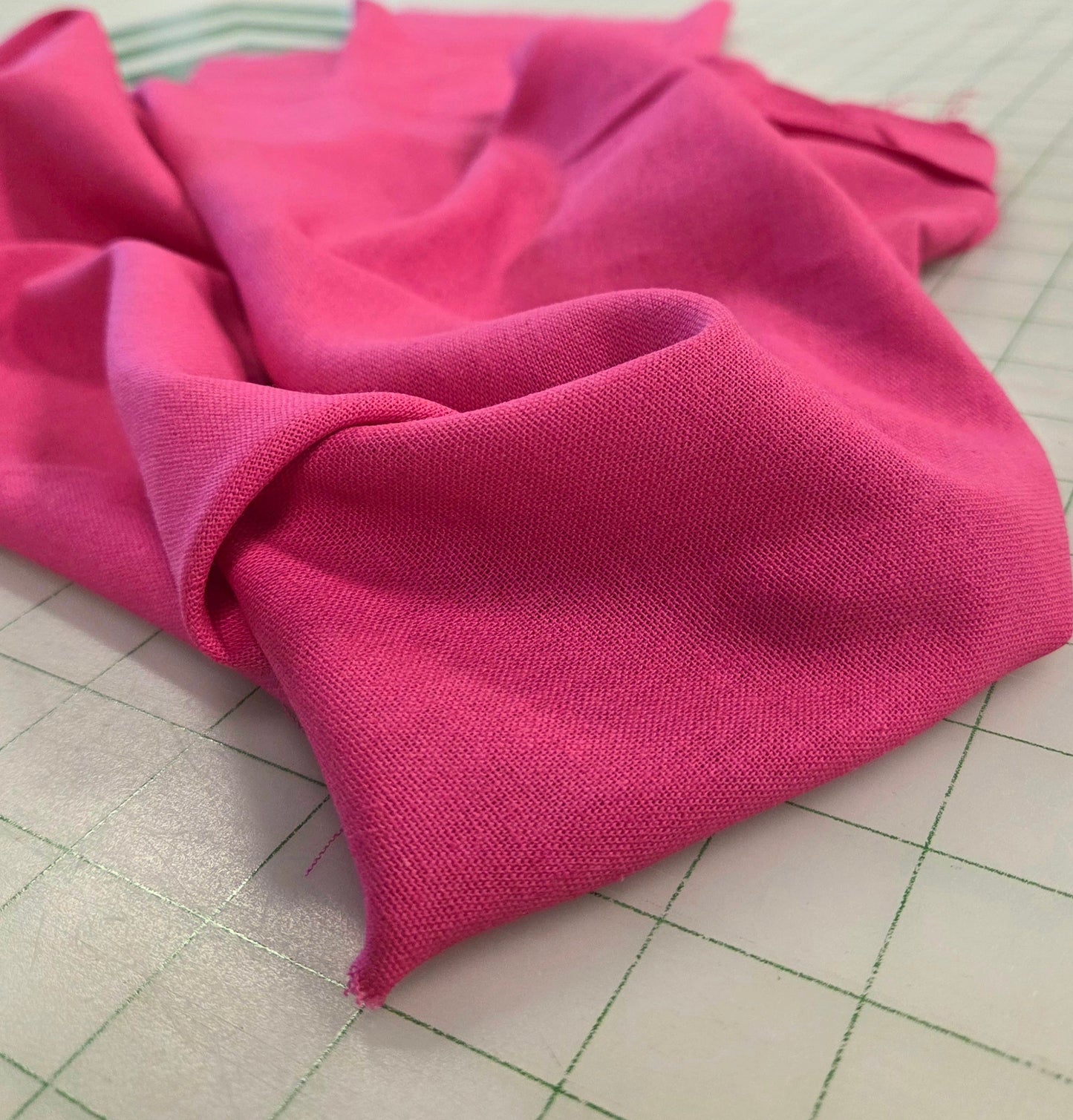linen rayon solid fuchsia woven retail by the yard. fabric shop apparel