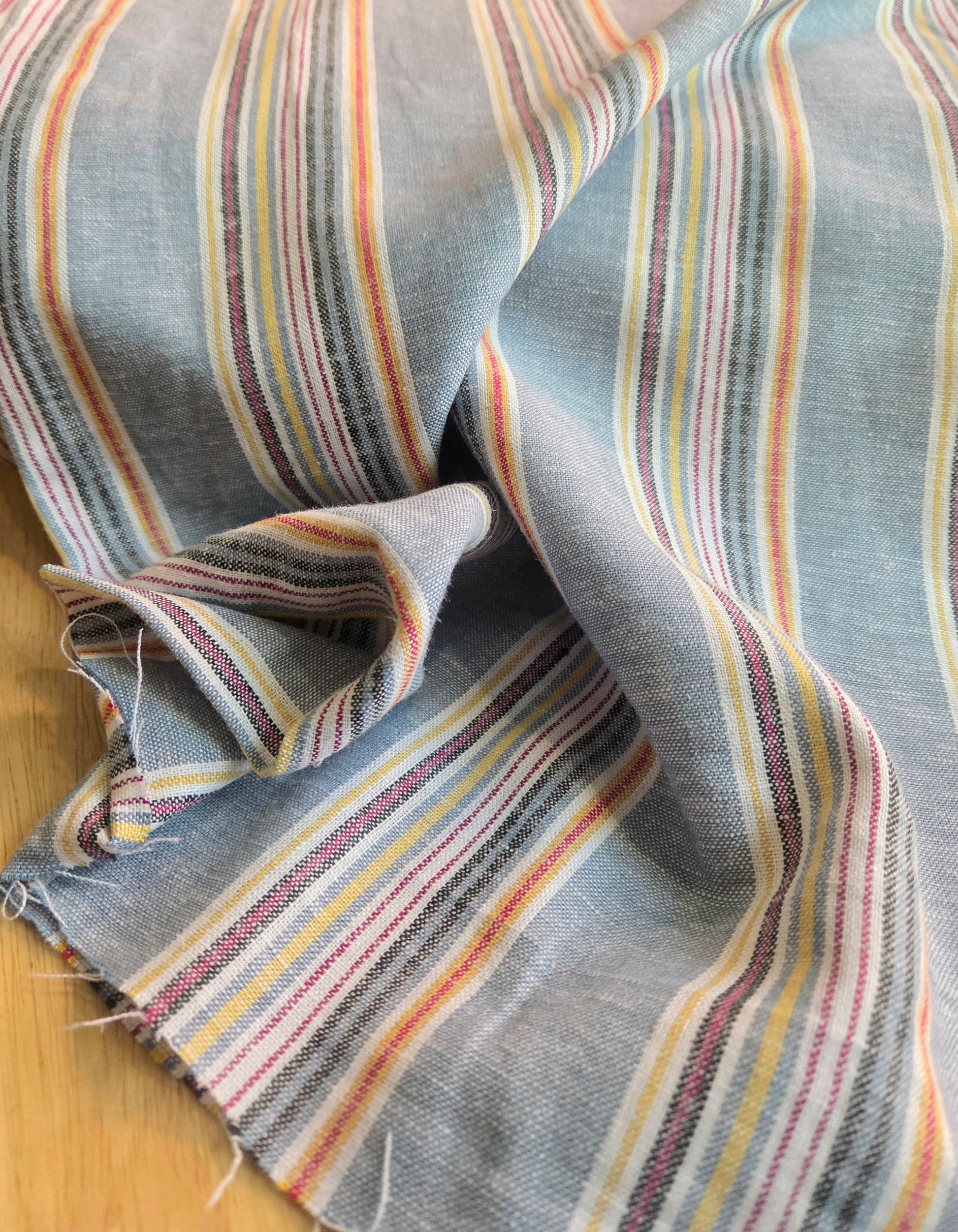 fashion fabric by the yard in Los Angeles. Chambray vertical stripe woven