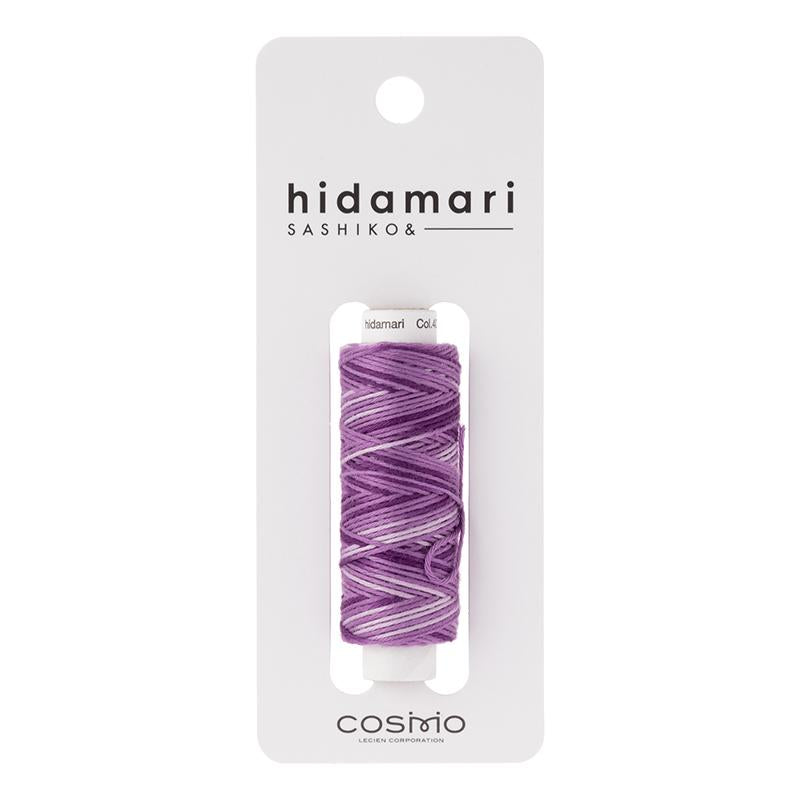 Hidamari Sashiko thread spool on a white card with brand name.