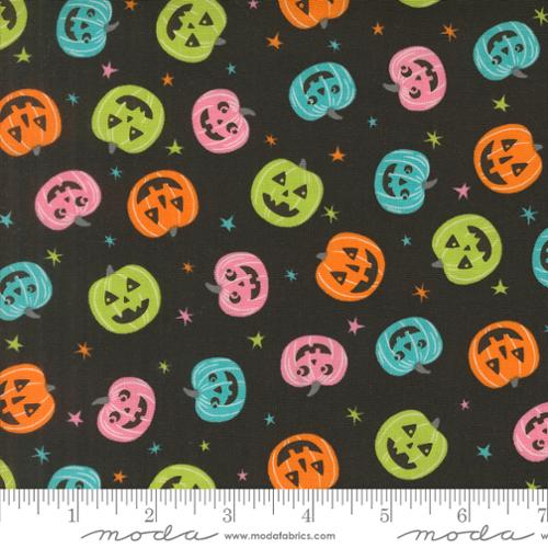 Colorful Halloween-themed fabric pattern with pumpkins on a black background, featuring Moda label.